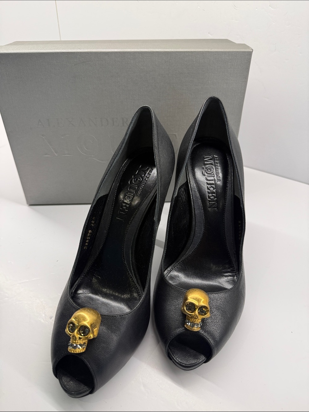 Alexander McQueen Black Leather Peep-Toe Pumps with Gold Skull Accent